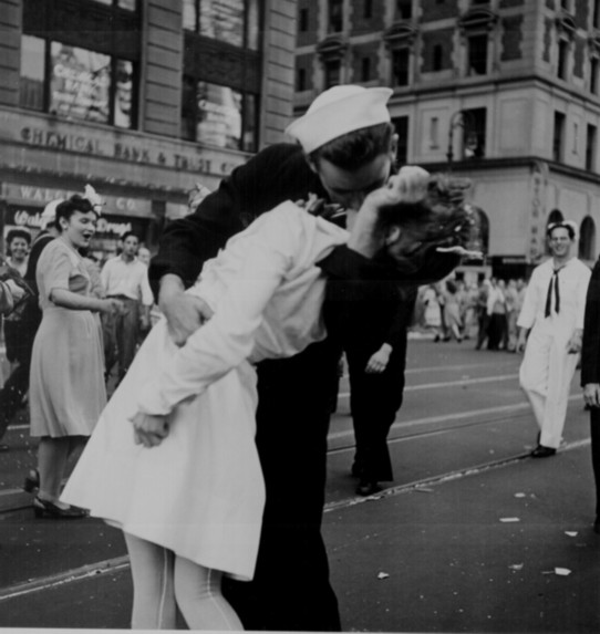 Black and white photograph, New York City celebrating the surrender of Japan 